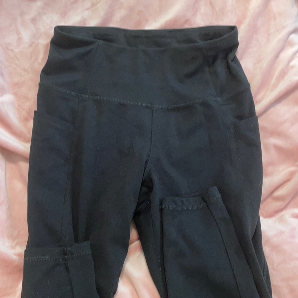 Black Danskin athletic wear leggings.